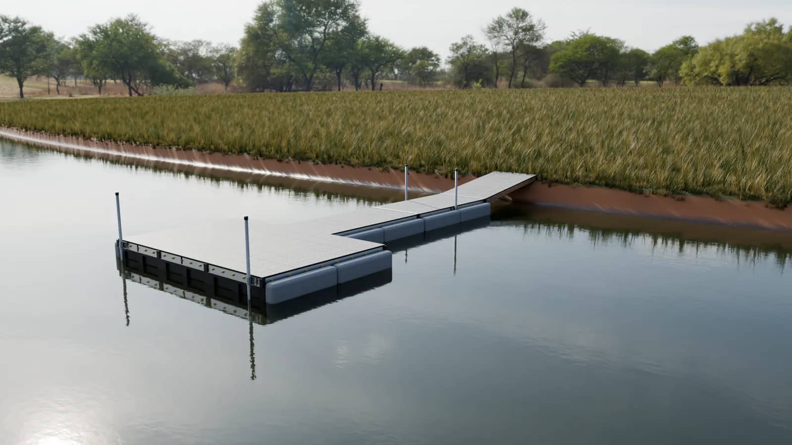 A Patriot T-shaped premium floating dock with gray poly decking on a Texas pond, held by four galvanized pipes through its piling sleeves: two on the first section near the bank and two at the far corners of the end platform