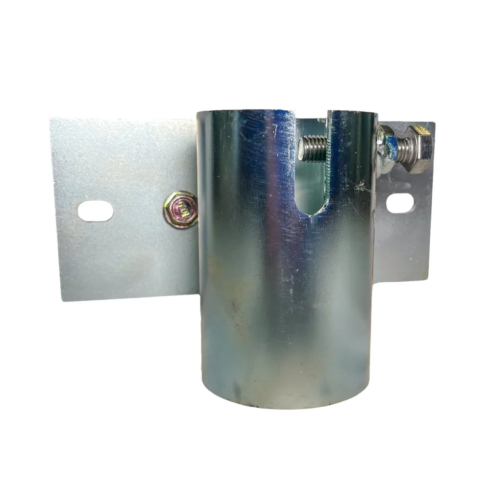 Patriot Docks galvanized piling sleeve on its slotted mounting plate, studio photo