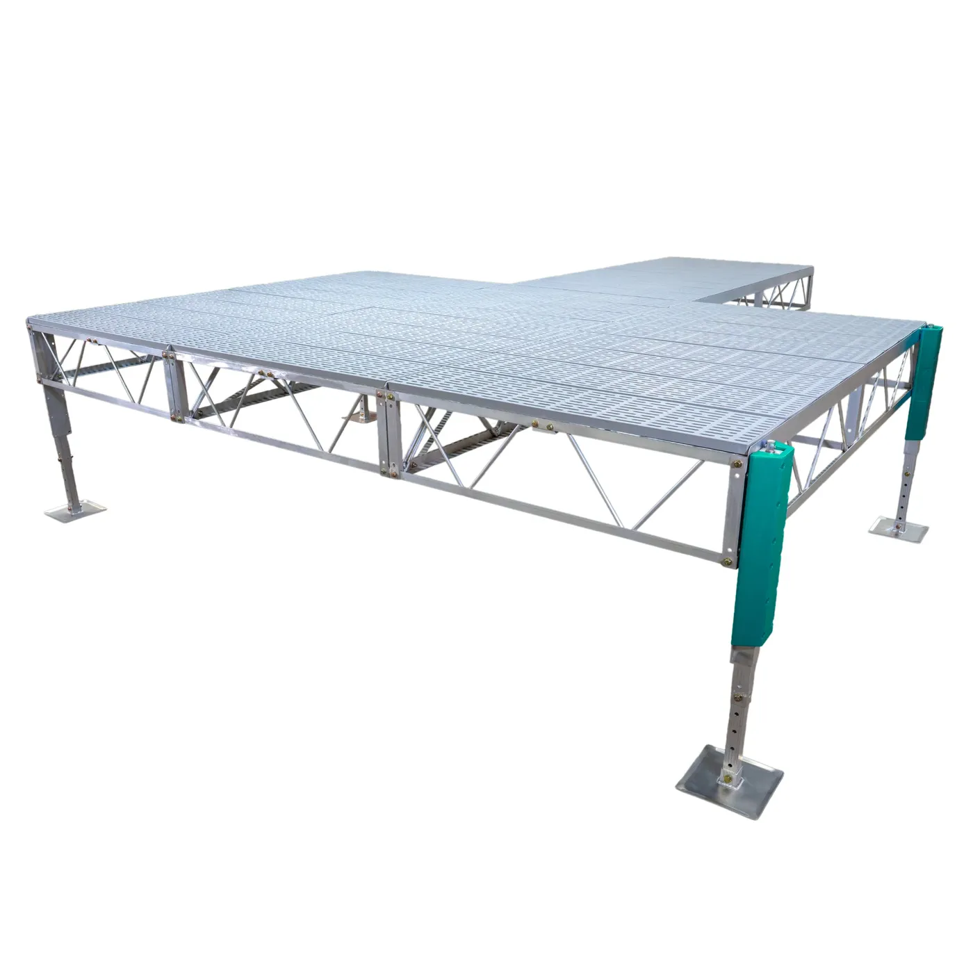 Patriot Docks stationary dock kit, product render on a white background: an aluminum truss frame carrying gray decking panels, standing on four adjustable legs with square footplates, two green bumpers on the near corner